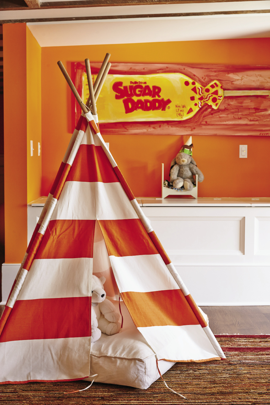 The architect fashioned a new stairwell to the attic, making the space a usable and spunky playroom for Marilen and baby sister Julia.