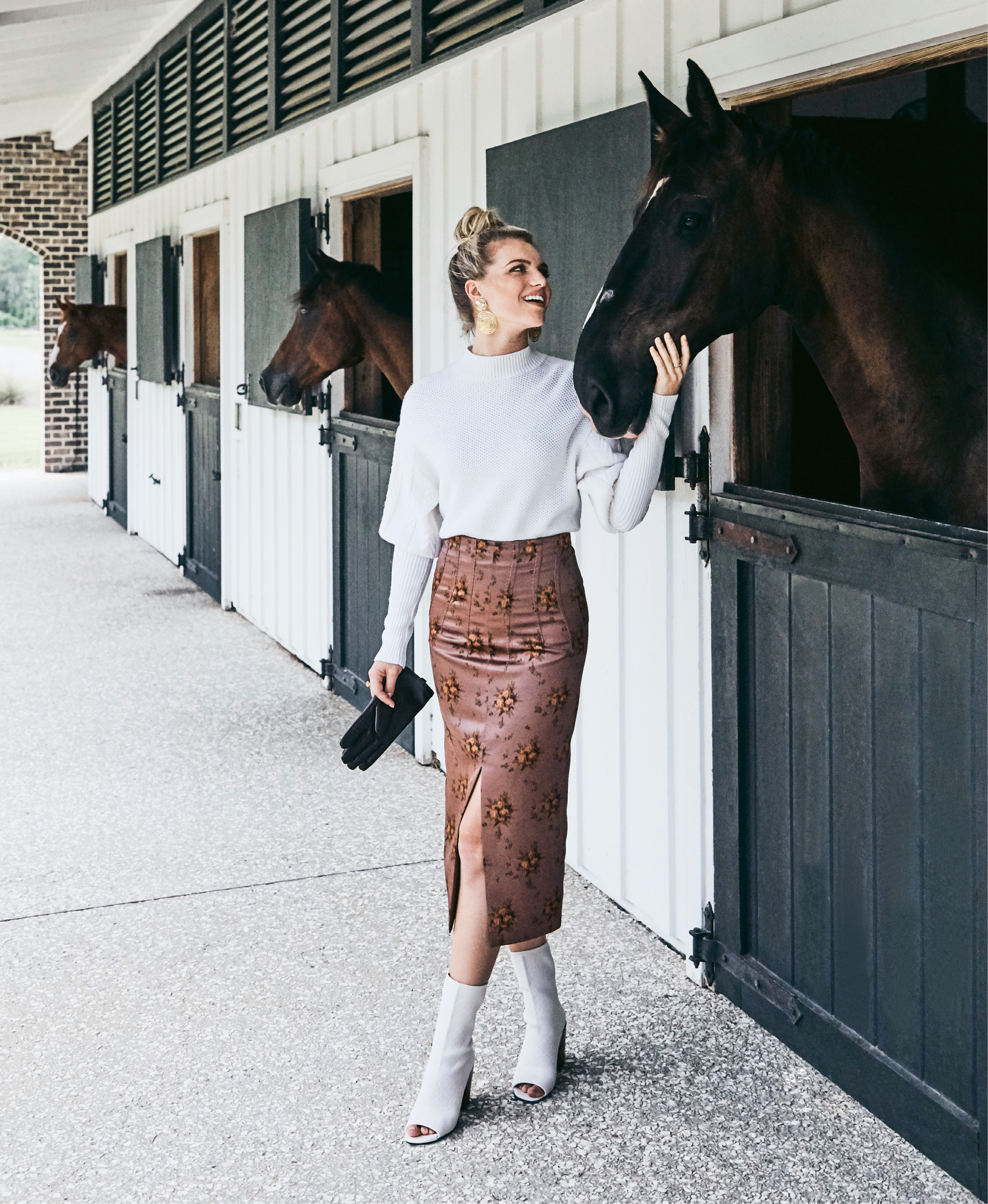 Good Neighbors - Jonathan Simkhai wool puff-sleeve sweater in “ivory,” $378 at Berlin’s for Women; Brock Collection “Sorrel” skirt, price upon request at RTW; Kelsi Dagger Brooklyn “Macey” knit peep-toe bootie in “vanilla,” $160 at Shoes on King; Gas Bijoux 24K gold-plate “Wave” earrings, $176 at Lori + Lulu; estate 18K gold ring, $1,335 at Croghan’s Jewel Box; leather snaffle gloves, $50 at Bits &amp; Pieces.  Pictured with (left to right) Peter Pan (owned by Olivia Johnson), Blarney (Dr. Katie Loewenstine D.V.M.), and Captain Morgan (Dorothy Knuppel)