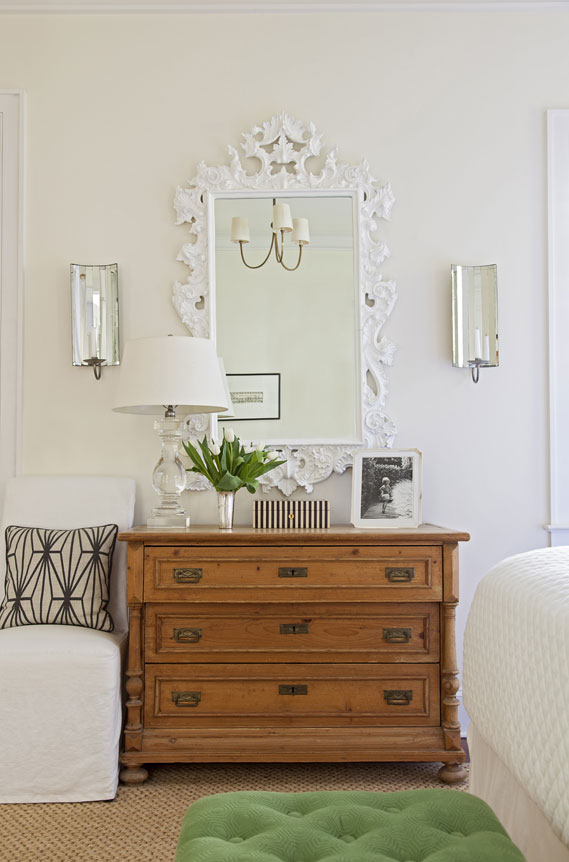Inspired by views of the adjacent nature preserve, Allison used vibrant green fabrics to upholster a headboard and bench for the master bedroom.