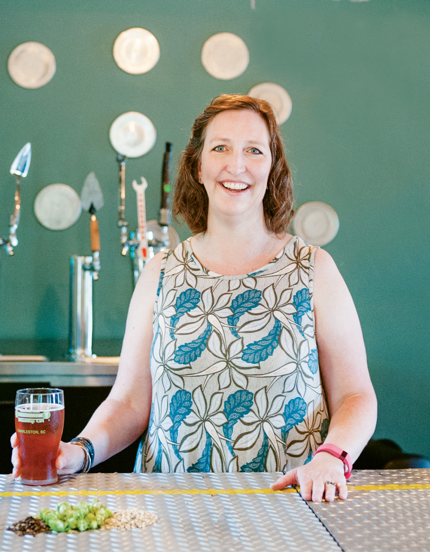 Sara Gayle McConnell behind the bar at Tradesman’s upstairs taproom