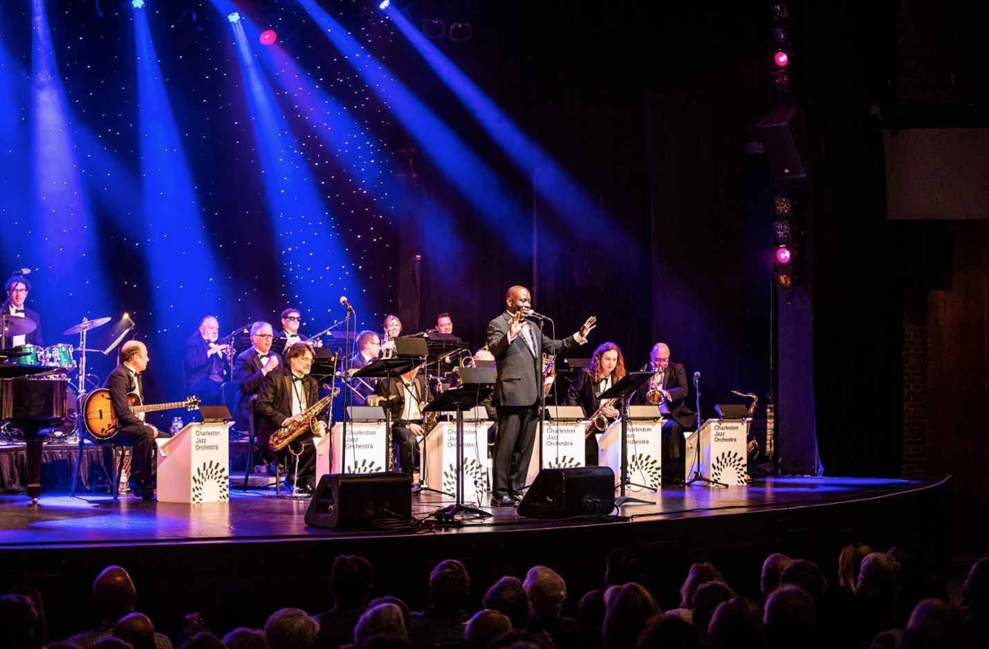 Jazzed Up: Charlton Singleton shown leading the Charleston Jazz Orchestra, and Mary Beth Natarajan, the executive director of Charleston Jazz, have seen steady audience growth for live jazz. The organization has recently expanded educational offerings through their Charleston Jazz Academy.