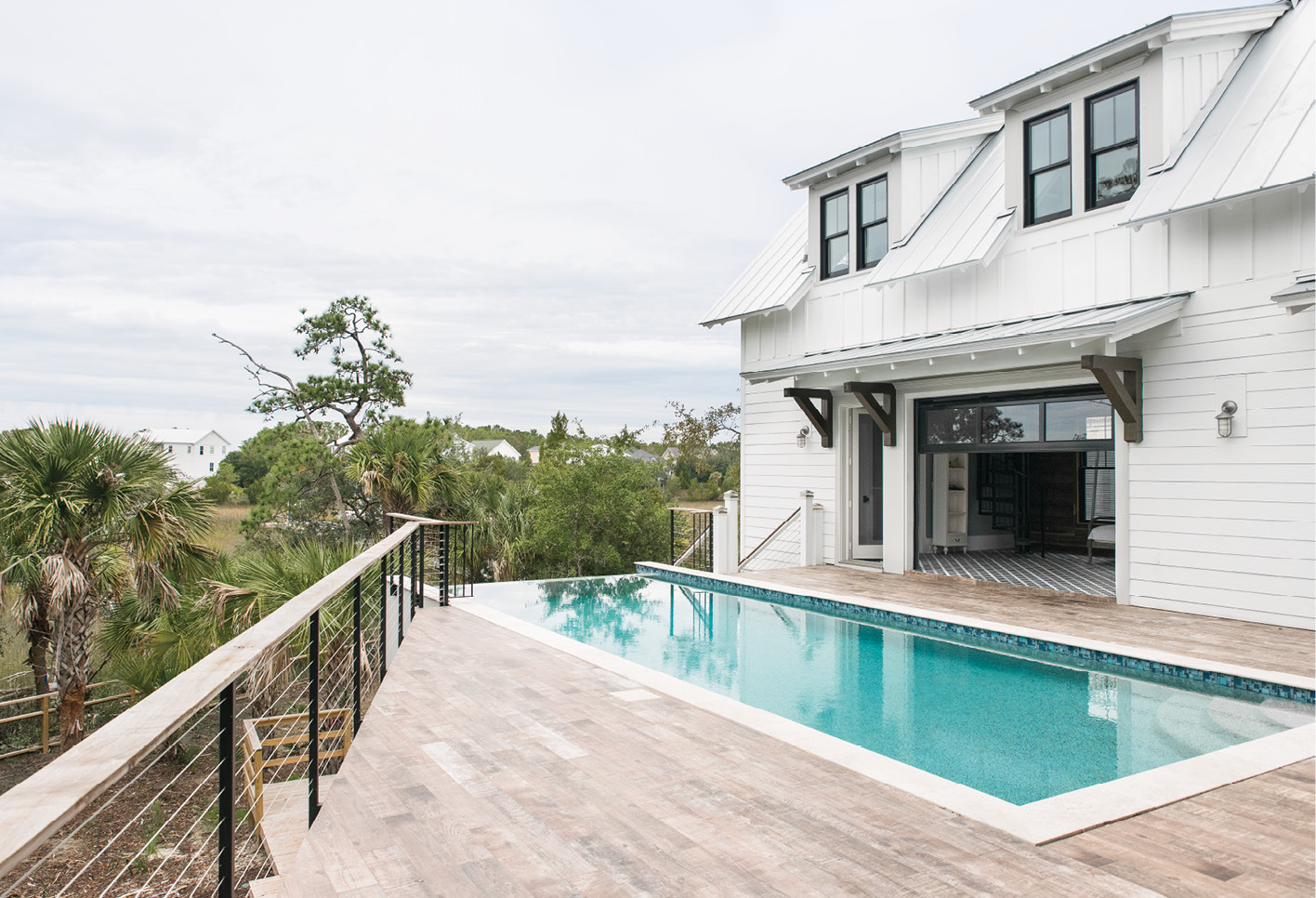 Mount Pleasant-based Aquatica Pools and Spas built the heated infinity pool, which overlooks the marsh and the Wando River.