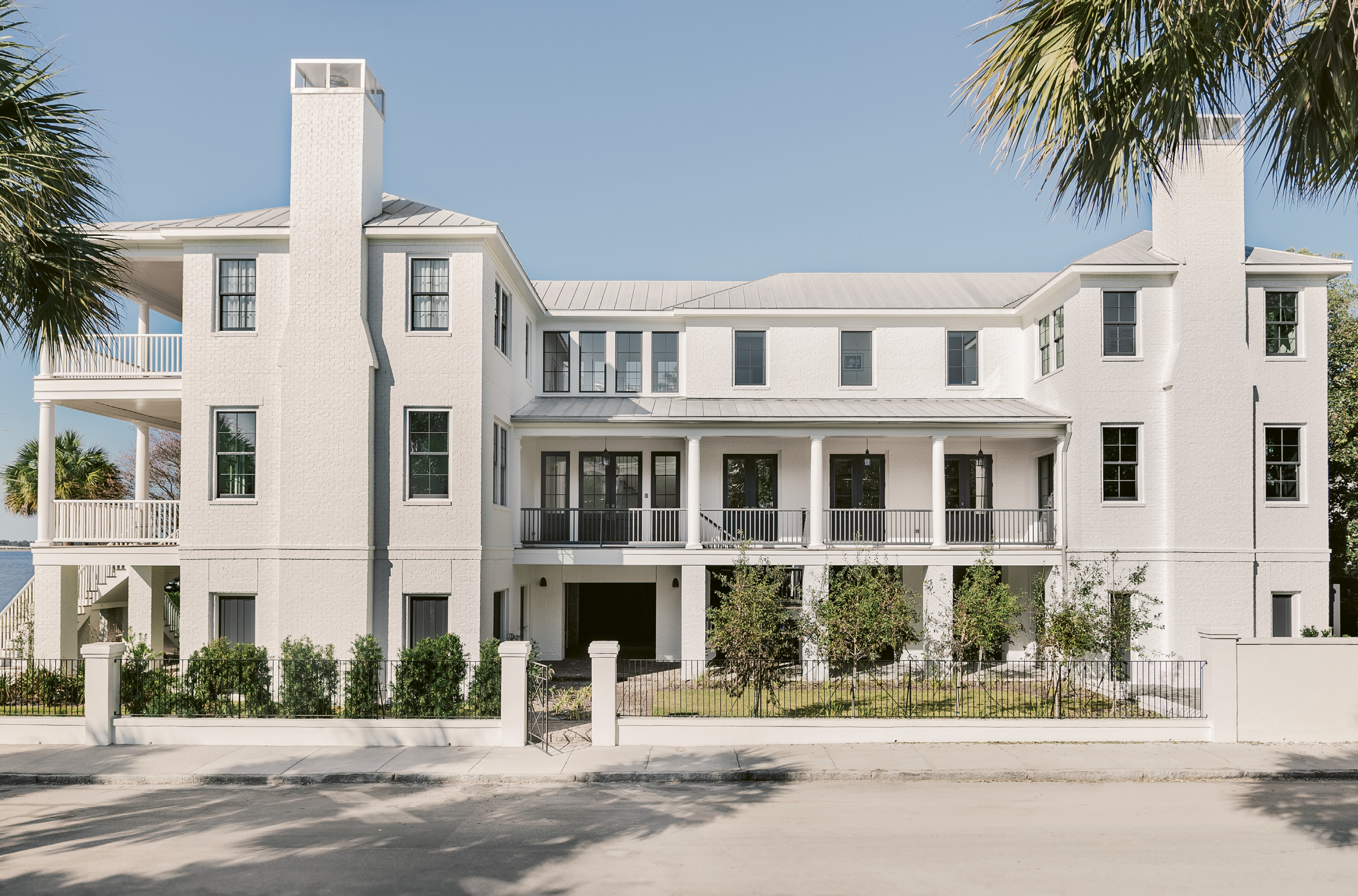 When viewed from the side, the home seems to morph into something more modern. “We call it traditional up front, party in the back,” jokes interior designer Cortney Bishop.