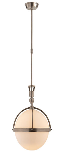 “Billy” pendant in polished nickel and white glass, $1,050, at Circa Lighting