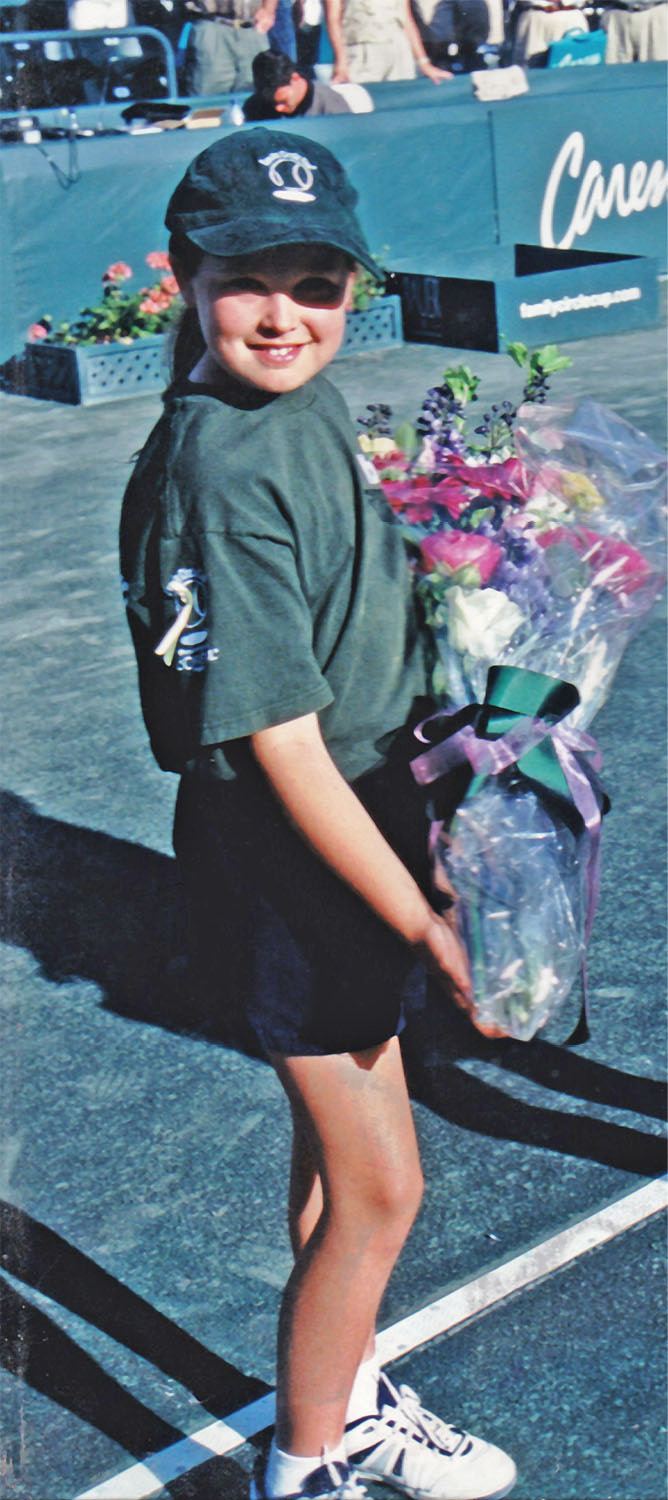 In 2001, as an eight-year-old ball crew member, Rogers was chosen to hand a bouquet to 2001 Family Circle Cup champion Jennifer Capriati.