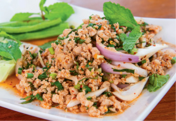 Laab Love: “The first dish my aunt taught me was laab, a staple salad in Laos. We broke down an entire cow to feed guests at her wedding!”