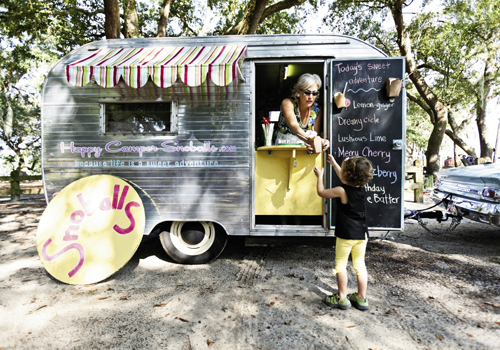 Rena Lasch tows her 1965 camper with a teal 1964 Rambler 660 Classic