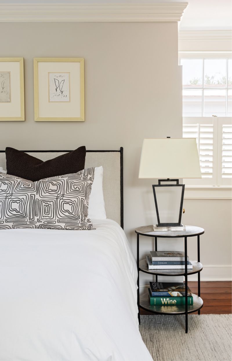 A trio of drawings by Horton lend their geometric shapes to this room’s more masculine style.