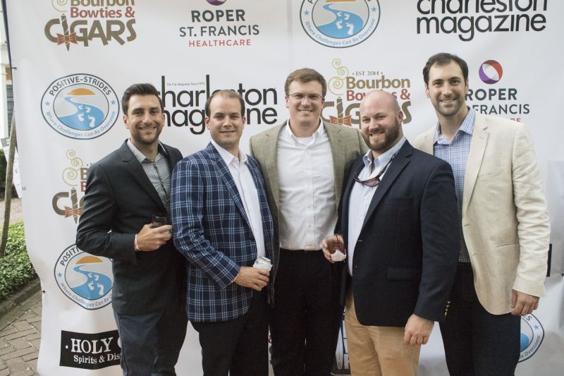 Partygoers snag a shot in the photo booth, presented by the event’s sponsors.