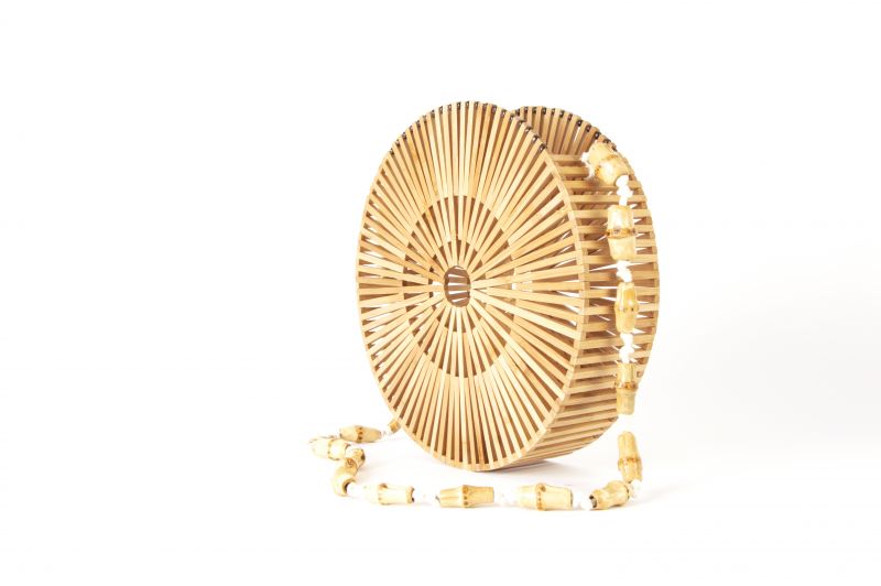 Moda Luxe circular wooden bag, $96 at Tres Carmen