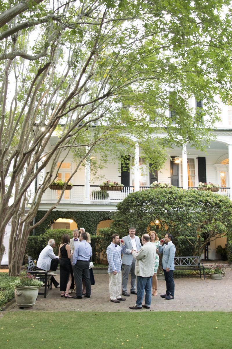 Guests gather in the back garden of the Thomas Bennett House.