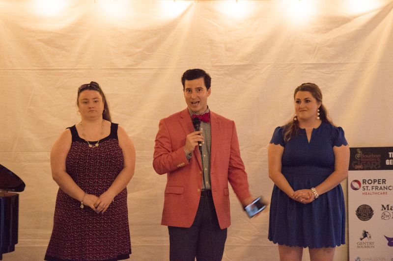 Ryan Brant with Positive Strides athletes Courtney Sprissler and Marissa Flora